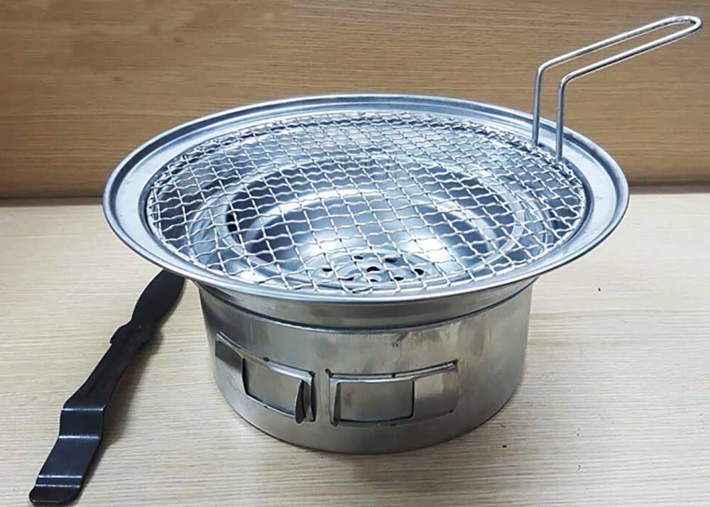 Bếp lẩu nướng than âm bàn tròn, tỏa nhiệt đều, dễ lắp đặt, phù hợp bàn ăn 4–6 người